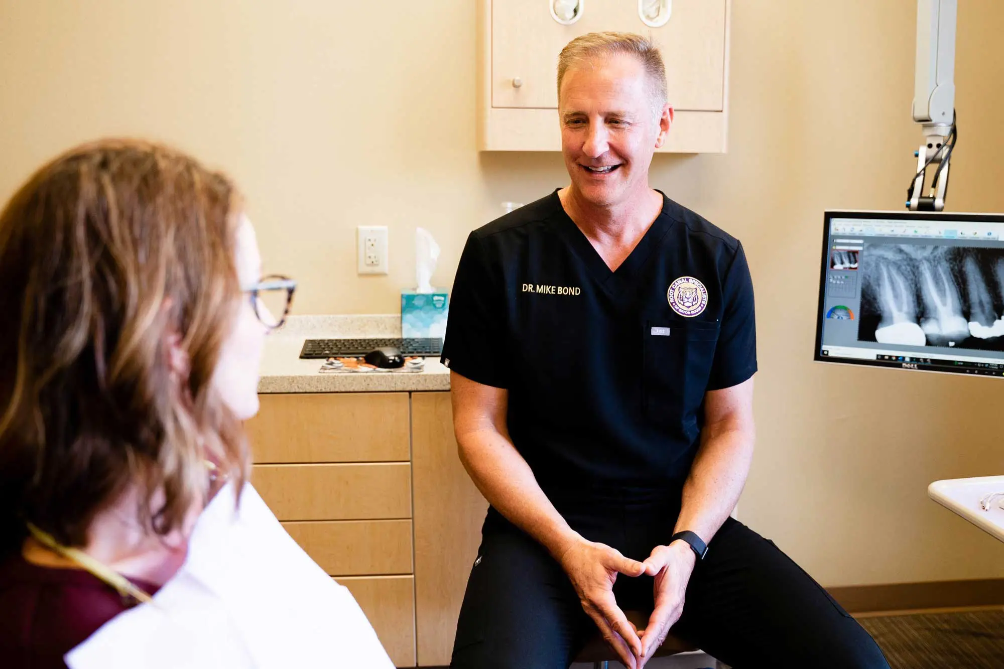 Dr. Bond meeting with patient