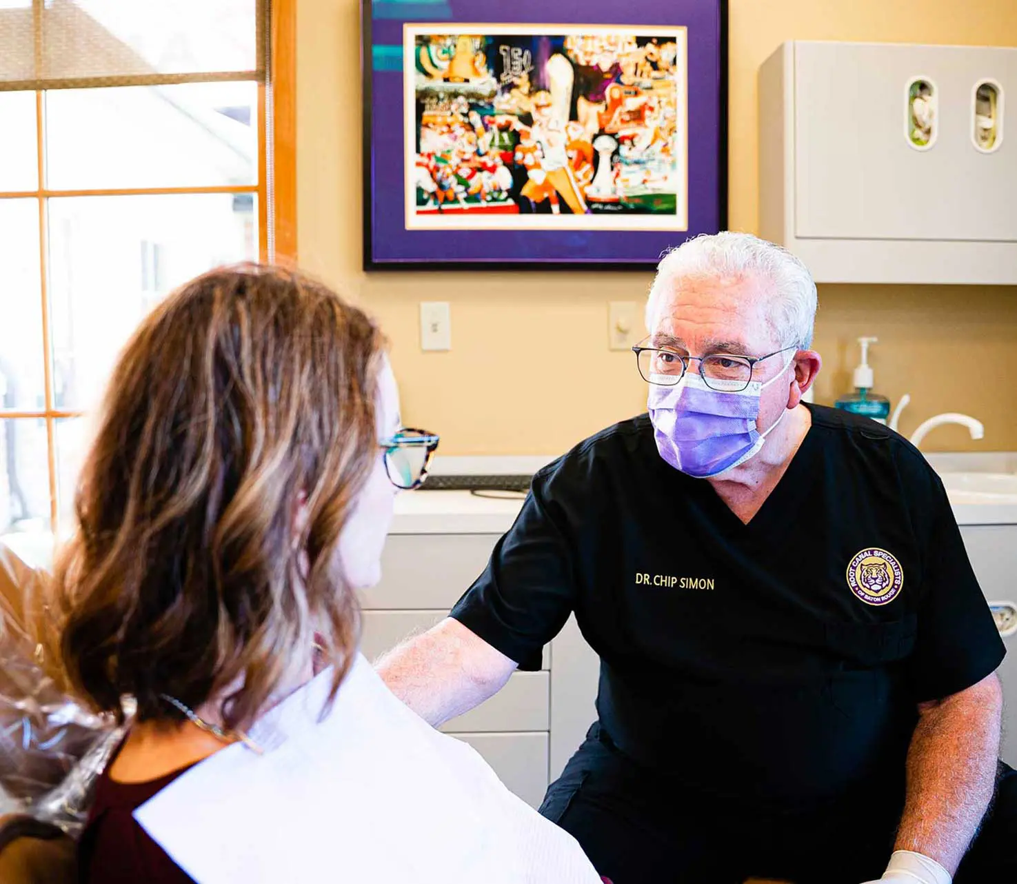 Dr. Simon meeting with patient